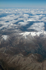 Massif and clouds, view from plane. Austria