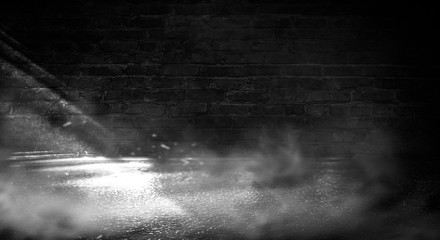 Background of an empty dark-black room. Empty brick walls, lights, smoke, glow, rays