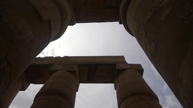 Big columns with hieroglyphs inside the karnak temple in egypt luxor.
