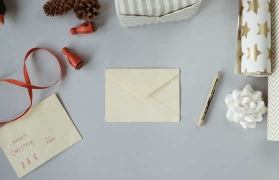 Writing Christmas cards and wrapping Christmas presents