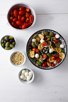 Mediterranean orecchiette with tomato, olives, mozzarella