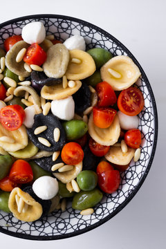 Mediterranean orecchiette with tomato, olives, mozzarella