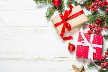 Fototapeta na wymiar Christmas background with fir tree, present box and decorations 