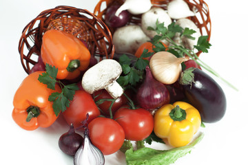 closeup.mushrooms and fresh vegetables in a wicker basket