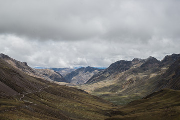 Landscape of the Vilcanota mountain chain, near by the famous rainbow mountain,  in a cloudy day of october. Perù.