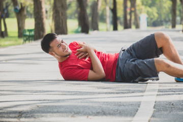 Asian man heart attack during running in park need CPR - Powered by Adobe