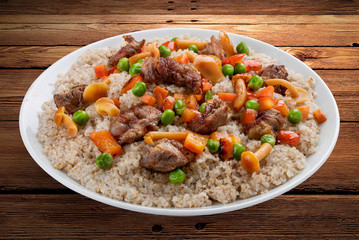 Barley porridge with pork and forest mushrooms
