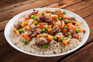 Barley porridge with pork and forest mushrooms