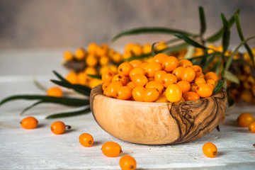 Sea buckthorn berries with leaves