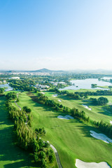 Obraz premium Aerial photograph of forest and golf course