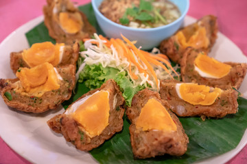deep-fried Salted egg cakes, Thai Food ,Salted egg on a special fish cakes