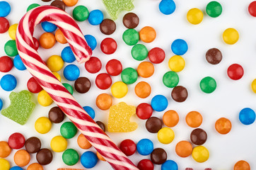 Abstract pattern with round color candy on background. Colorful sweets top view. Flat lay image