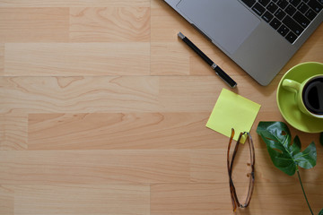 Top view office table with office accessories and copy space.