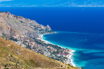 Fototapeta na wymiar View of Taormina's coastline from Castelmola village. Castelmola, Sicily, Italy.