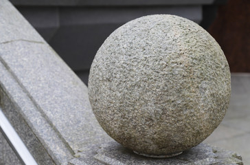 Closeup of an outdoor sphere marble stone work in sunny day. 