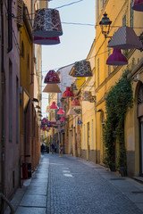 Fototapeta na wymiar Narrow Italian street with colorful buildings