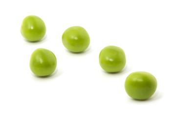 Green peas isolated on the white background