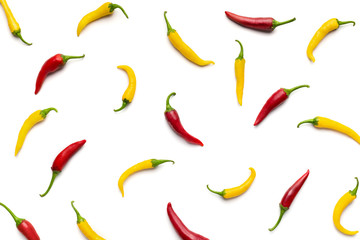 Red and yellow hot peppers abstract background