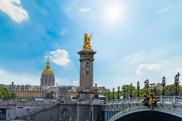 Fototapeta na wymiar Pegasus golden statue on Alexander III bridge