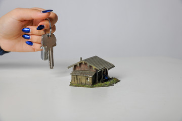 hand symbolisch eigenheim haus hauskauf hausbau wohnraum