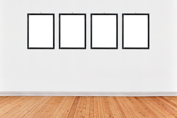 white wall background with wooden floor and hanging frames