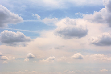 natural background fluffy cumulus white and dark clouds