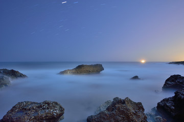 Fototapeta na wymiar Noche en la costa