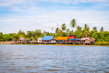 Fototapeta premium Local houses on pillars, Thailand