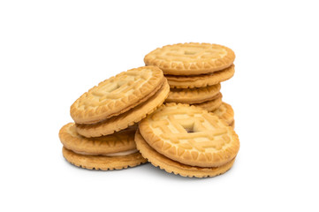 Sandwich cookies with cream on white.
