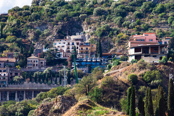 View from Letojanni to Taormina. Letojanni nestled to the north of Taormina, Letojanni is a popular coastal resort. Sicily, Italy.