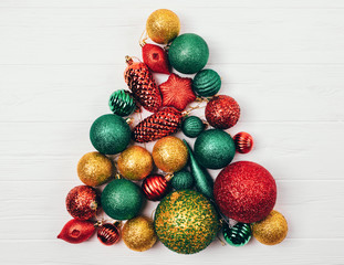 Christmas tree made of balls and toys creative composition