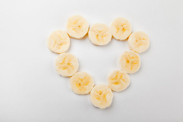 Banana heart symbol white background 