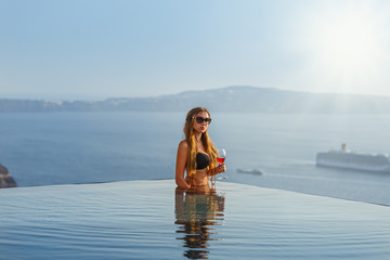 Young woman in the pool