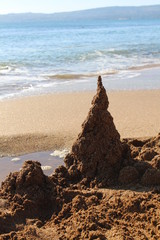 Sand castles on the sea coast