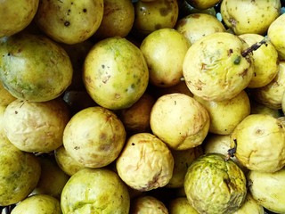 Close up view of ripe yellow passion fruit.