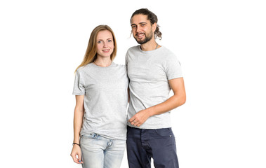 Fototapeta premium Portrait of happy couple on white background. Couple man and woman hugging and looking at camera.