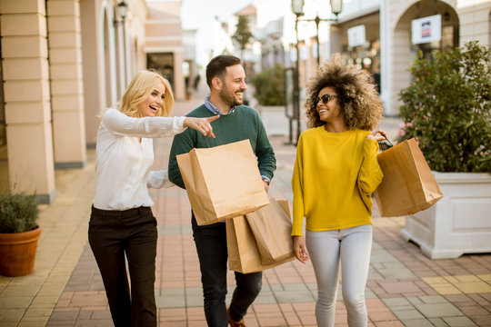 Young multiracial people in shopping