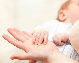 hands -  baby and parents