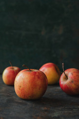 Wild apple on rustic background
