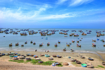 Vietnamese fishing boats in the morning after hard night of fishing. Mui Ne, Vietnam