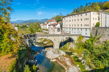 Fototapeta na wymiar Castelnuovo di Garfagnana on a sunny day. Province of Lucca, Tuscany, Italy.