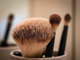 Makeup brushes in tube.