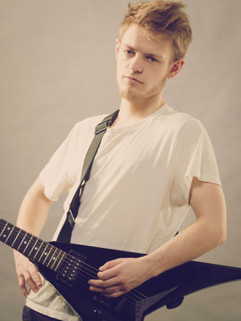 Man playing on electric guitar