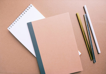 Blank notebook with pencil