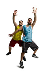 Basketball players receiving a pass