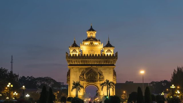 Vientiane Laos time lapse 4K, city skyline day to night sunset timelapse at Patuxai (Patuxay)