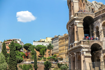 Detail of the facade of the Colosseum under a sunny day. Rome Italy.