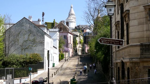 Montmartre Sacre Coeur pointer from Place Dalida in Paris - most beautiful street