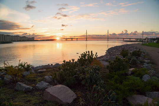 Evening view of the bridge over the Petrovsky canal, ZSD Central section at sunset.