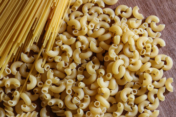 Variety of types and shapes of dry Italian pasta